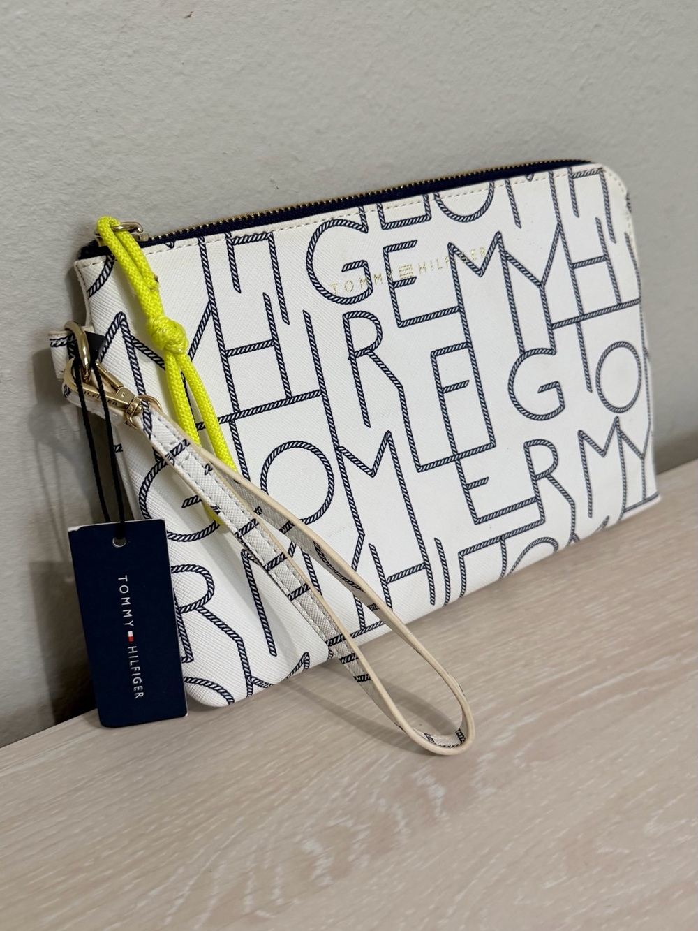 Tommy Hilfiger White Wristlet with Navy Logo Print and Neon Yellow Pull